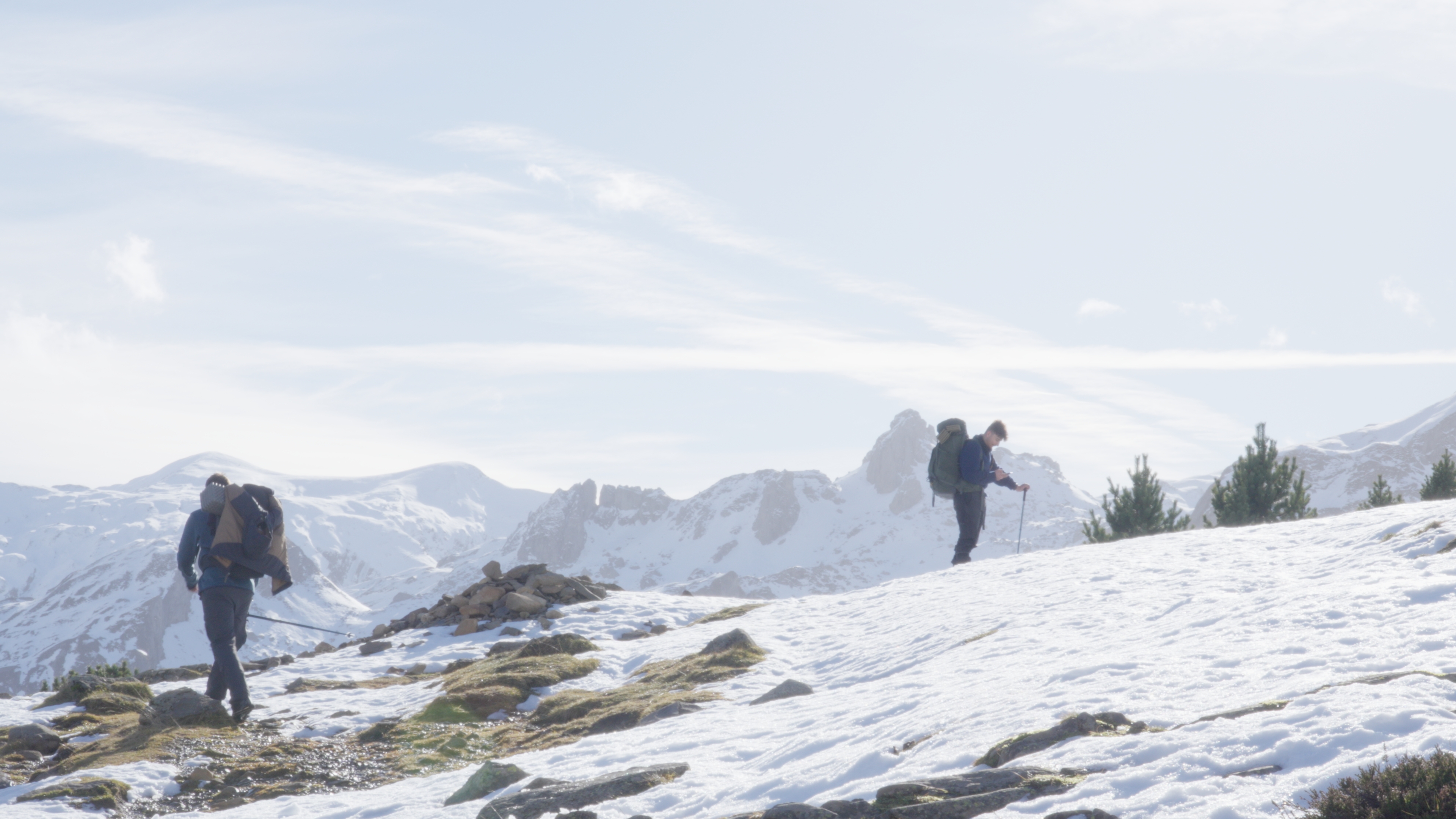 Hikers crossing the snowy Pyrénées